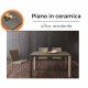 Tavolo allungabile con piano in ceramica con 4 sedie in ecopelle 